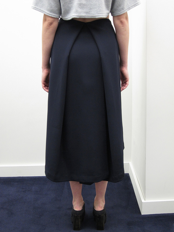 KAAREM Piece of Ring Pleated Midi Skirt KAAREM Piece of Ring Pleated Midi Skirt