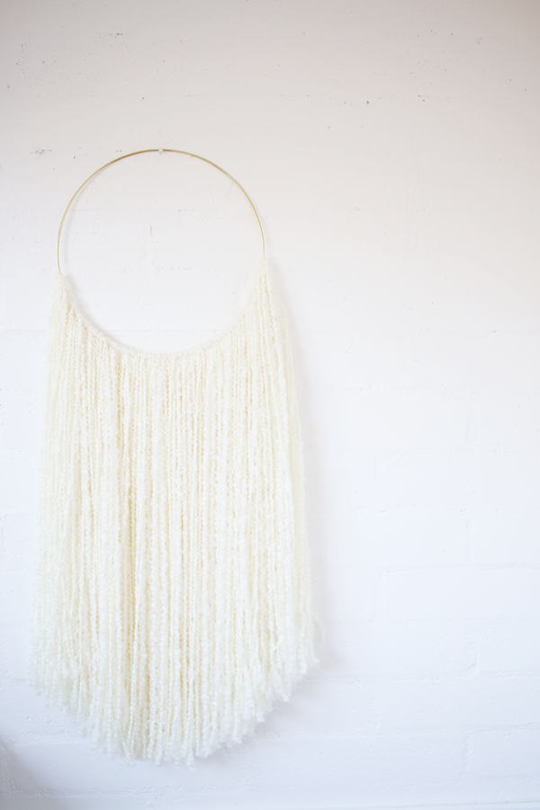 Sonadora White Fiber and Polished Brass Wall Hanging Sonadora White Fiber and Polished Brass Wall Hanging