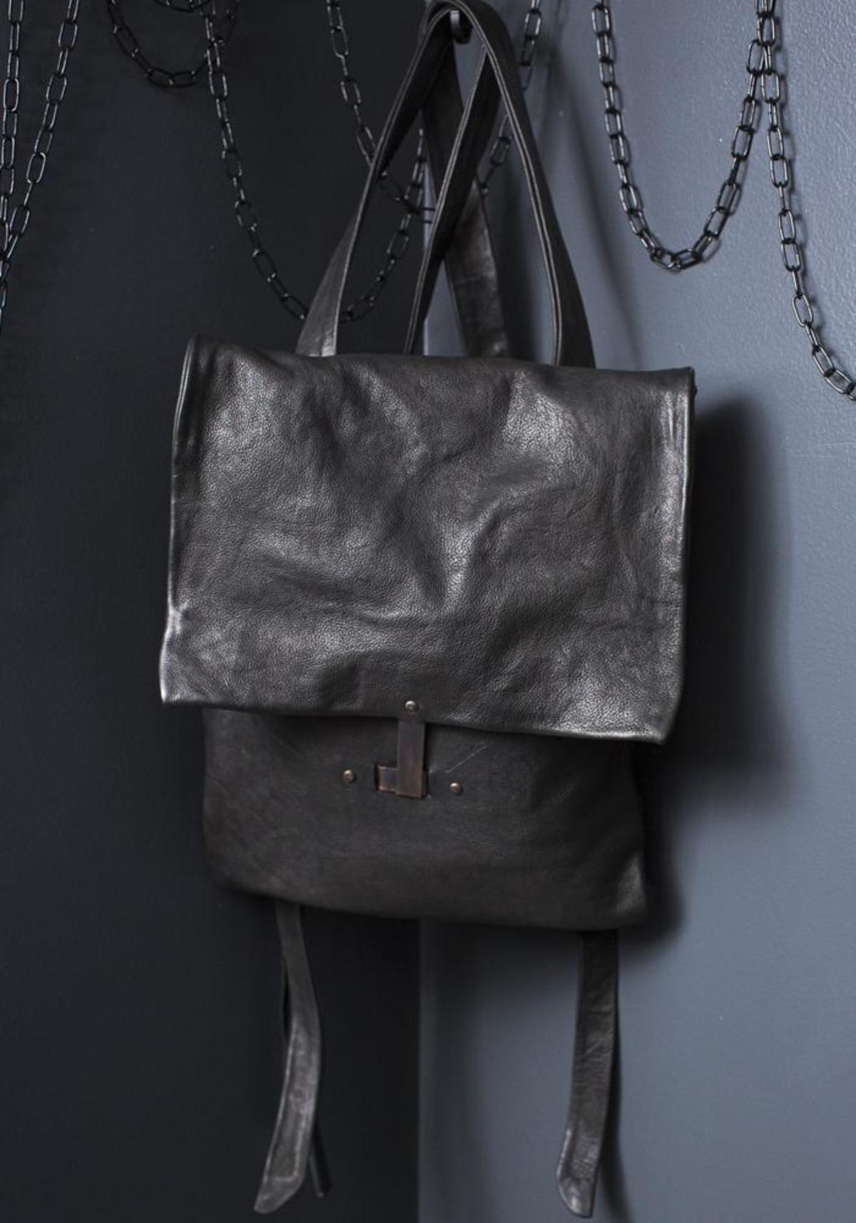 leather fold over backpack